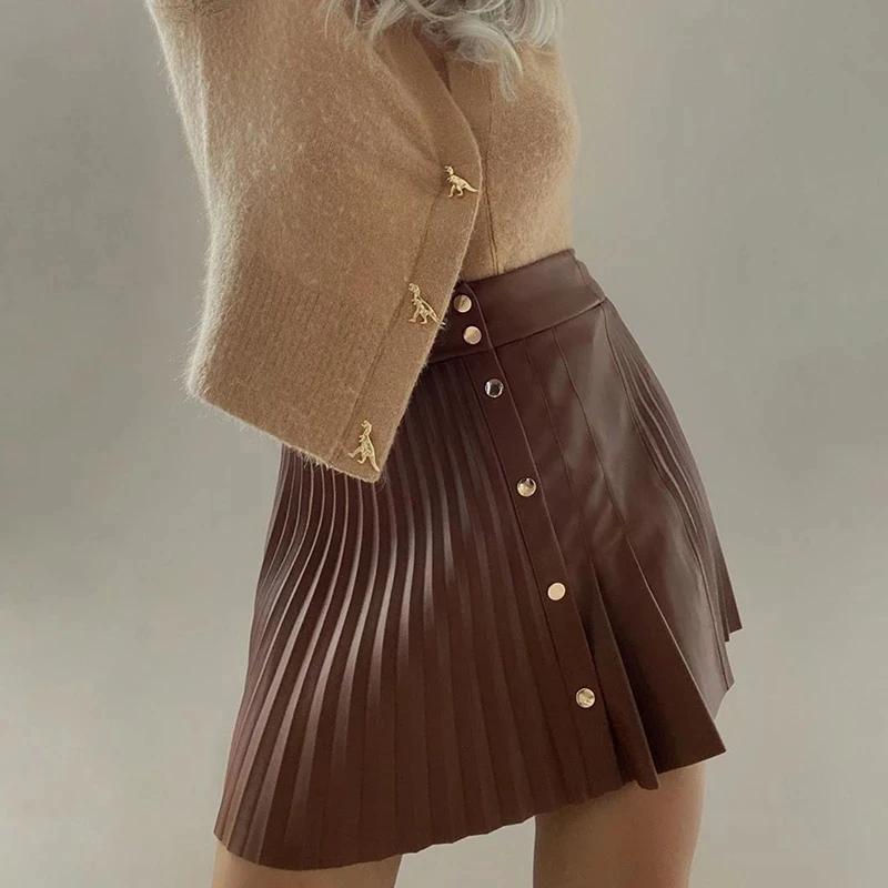 Ženy Vysoké Pasu Tlačítka Sexy Mini Skládaný Sukně 2023 Pevné Pu Kožené Sukně Asymetrický Módní Ženy Podzim Pracovní Oděvy